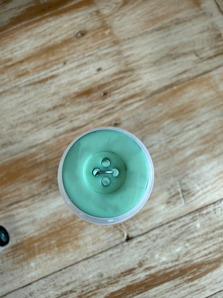 Glossy 4 hole button with rim - 24