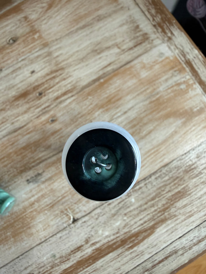 Glossy 4 hole button with rim - 24